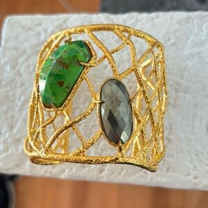 Alexis bitter gold webbed large cuff bracelet with green stone